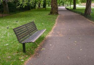 park bench in greenway trail path in knoxville tennessee